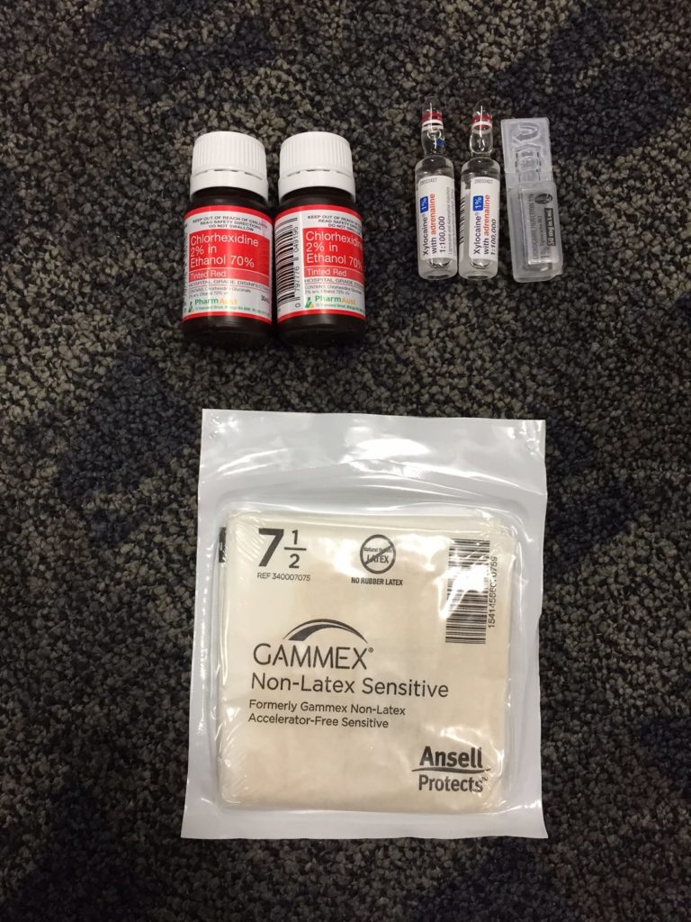 antiseptic, local anaesthetic and gloves